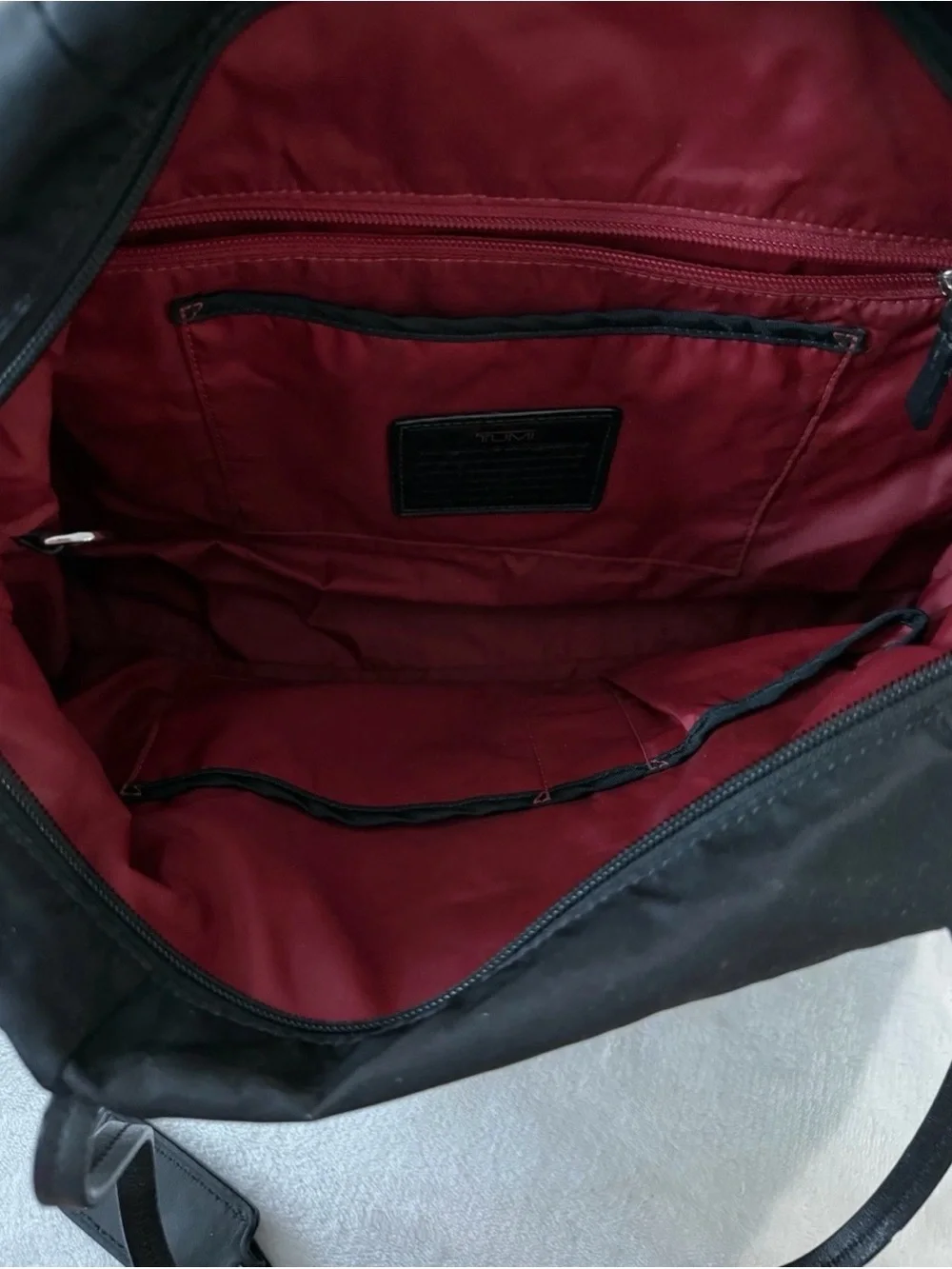 Tumi Voyageur Q-Tote Bag in black nylon with leather trim